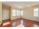Bright living room with wood floors, ample natural light, and neutral color palette for easy customization at 4010 W Fremont Rd, Phoenix, AZ 85041