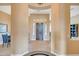 Open foyer showcasing a decorative tile floor design and a direct view into the dining area at 41819 N Anthem Ridge Dr, Phoenix, AZ 85086