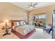 Main bedroom with access to the pool and patio, creating a seamless indoor-outdoor flow at 41819 N Anthem Ridge Dr, Phoenix, AZ 85086