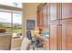 Home office area with built-in cabinetry, providing ample storage and workspace at 41819 N Anthem Ridge Dr, Phoenix, AZ 85086