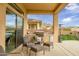 Outdoor kitchen featuring a built-in grill and cozy seating, perfect for entertaining at 41819 N Anthem Ridge Dr, Phoenix, AZ 85086