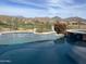 Inviting pool with a golf course view in this desert home community at 41819 N Anthem Ridge Dr, Phoenix, AZ 85086