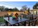Spacious backyard featuring a putting green, an outdoor seating area, and a covered hot tub at 4714 N Miller Rd, Scottsdale, AZ 85251