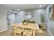 Dining room with a large table and seating for six at 4714 N Miller Rd, Scottsdale, AZ 85251