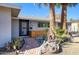Beautiful brick pathway to front door with unique desert landscaping at 4714 N Miller Rd, Scottsdale, AZ 85251