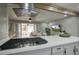 Beautiful kitchen featuring stone countertops and stainless steel appliances at 4714 N Miller Rd, Scottsdale, AZ 85251