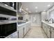 Spacious kitchen with modern appliances and bright lighting at 4714 N Miller Rd, Scottsdale, AZ 85251