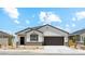 Charming single-story home featuring neutral-toned stucco and a two-car garage, perfect for suburban living at 48401 N Duran Way, Gold Canyon, AZ 85118