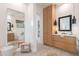 Bright bathroom featuring dual vanities, soaking tub, and neutral finishes at 6069 E Ironwood Dr, Scottsdale, AZ 85266
