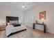 Inviting bedroom with wood floors, stylish furnishings, and a serene atmosphere at 6069 E Ironwood Dr, Scottsdale, AZ 85266