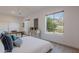 Comfortable bedroom with a large window, natural light, and closet at 6069 E Ironwood Dr, Scottsdale, AZ 85266