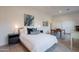 Cozy bedroom with modern decor, an ensuite bathroom, and closet space at 6069 E Ironwood Dr, Scottsdale, AZ 85266
