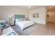 Bright bedroom with a plush bed, decorative pillows, and a serene ambiance at 6069 E Ironwood Dr, Scottsdale, AZ 85266