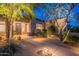 Charming home exterior with desert landscaping, highlighting the inviting front entrance at 6069 E Ironwood Dr, Scottsdale, AZ 85266