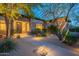 Inviting front yard featuring desert landscaping and a charming walkway leading to the home's entrance at 6069 E Ironwood Dr, Scottsdale, AZ 85266