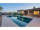 Swimming pool featuring a pool deck, desert landscaping, and outdoor lounge furniture at 6069 E Ironwood Dr, Scottsdale, AZ 85266