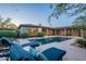 Backyard pool area with lounge chairs, desert landscaping, and inviting outdoor space at 6069 E Ironwood Dr, Scottsdale, AZ 85266