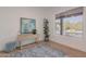 Bright room featuring a console table, decor, and a picture window at 6069 E Ironwood Dr, Scottsdale, AZ 85266