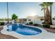 Backyard pool with desert landscaping, including a built-in barbeque and covered outdoor dining at 6119 E Sandra Ter, Scottsdale, AZ 85254