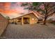 Spacious backyard with patio, desert landscaping, and plenty of room for entertaining at 6520 E Hacienda La Noria Ln, Gold Canyon, AZ 85118