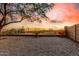 Private backyard featuring desert landscaping and fence, perfect for relaxing or entertaining at 6520 E Hacienda La Noria Ln, Gold Canyon, AZ 85118