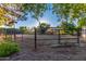 Fenced horse arena with natural ground at 6615 E Desert Cove Ave, Scottsdale, AZ 85254