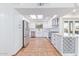 Beautifully renovated kitchen with stainless appliances, ample cabinet space, and granite countertops at 6615 E Desert Cove Ave, Scottsdale, AZ 85254