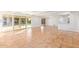 Bright and spacious living room with tile flooring, sliding glass doors, and access to the backyard pool at 6615 E Desert Cove Ave, Scottsdale, AZ 85254