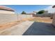Large backyard featuring a concrete patio and surrounding block wall, great for creating your dream oasis at 6630 W Superior Ave, Phoenix, AZ 85043