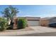 Charming single-story home featuring a two-car garage and desert landscaping, perfect for low-maintenance living at 6630 W Superior Ave, Phoenix, AZ 85043