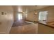 Open floor plan with adjacent living and dining area with great natural light, ready for your personal touch at 6820 S 68Th Ln, Laveen, AZ 85339