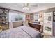 Bedroom view features a dresser, white trim and natural light at 8637 E Solano Dr, Scottsdale, AZ 85250