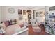 Bedroom showcasing daybed, wicker chair, and ample natural light at 8637 E Solano Dr, Scottsdale, AZ 85250
