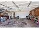 Spacious two car garage providing ample workspace, tool storage, and direct access to the home's interior at 8637 E Solano Dr, Scottsdale, AZ 85250