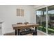Bright dining area featuring hardwood floors, modern decor and natural light at 9050 N 51St Ln, Glendale, AZ 85302