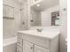 Bathroom featuring modern vanity, marble tile, and updated fixtures at 1028 W 5Th St, Mesa, AZ 85201