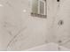 Modern bathroom showing tile work, window and shower/tub at 1028 W 5Th St, Mesa, AZ 85201