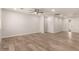 Spacious living room with new hardwood floors, neutral walls, and recessed lighting at 1028 W 5Th St, Mesa, AZ 85201