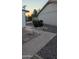 Landscaped backyard showcasing brick walkways, decorative rock, and vibrant desert foliage at 1044 N Arvada N --, Mesa, AZ 85205