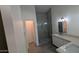 Well-lit bathroom with modern fixtures, glass shower, and stylish vanity with dual sinks at 1044 N Arvada N --, Mesa, AZ 85205