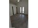 Neutral bedroom featuring sliding closet doors and tile flooring at 1044 N Arvada N --, Mesa, AZ 85205