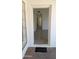 Neutral entryway with tile flooring and white walls leading to other rooms in the home at 1044 N Arvada N --, Mesa, AZ 85205