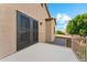 Spacious covered balcony area with double doors, perfect for enjoying outdoor living at 1073 N Layman St, Gilbert, AZ 85233