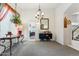 Bright dining room with bar, light fixtures and access to the kitchen at 1073 N Layman St, Gilbert, AZ 85233