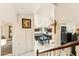 Bright entryway providing a view of the kitchen and dining area beyond the staircase at 1073 N Layman St, Gilbert, AZ 85233