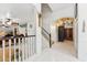 Elegant entryway showcasing a staircase and a view into the living and dining areas at 1073 N Layman St, Gilbert, AZ 85233