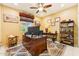 Office with a large wooden desk, neutral walls, and a window for natural light at 1073 N Layman St, Gilbert, AZ 85233