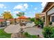 Lush backyard featuring a pool, outdoor dining, and a built-in barbecue grill at 1073 N Layman St, Gilbert, AZ 85233