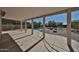 Covered patio overlooking a backyard pool area and desert landscaping at 1114 S 220Th Ave, Buckeye, AZ 85326