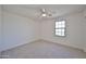 Bedroom featuring neutral carpet and a window at 1114 S 220Th Ave, Buckeye, AZ 85326